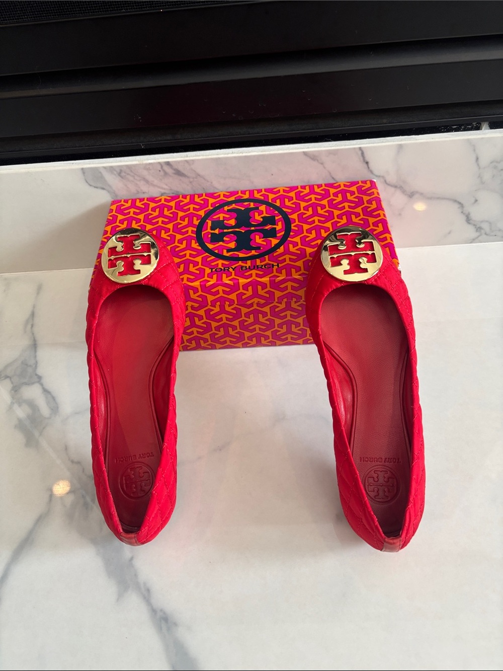Tory Burch Bright Red Quilted Logo Flats with Gold Emblem